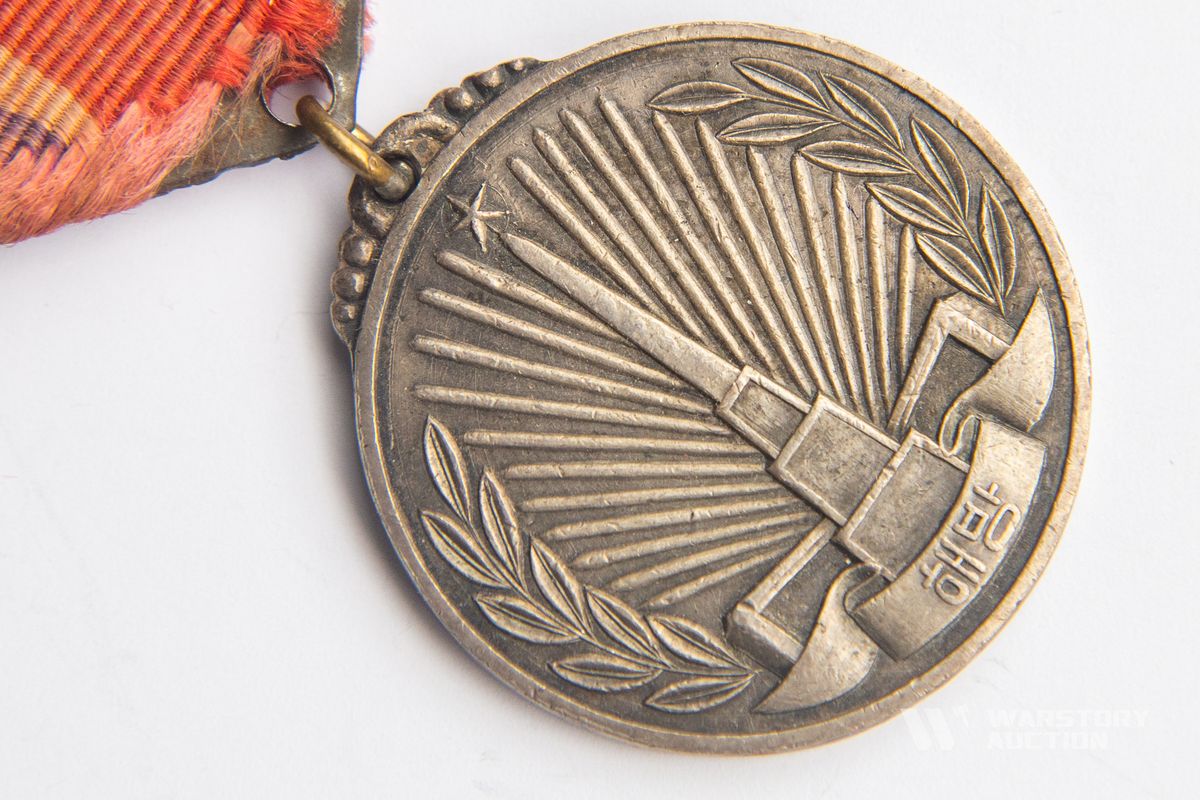 WARSTORY AUCTION - Медаль «За освобождение Кореи». КНДР.