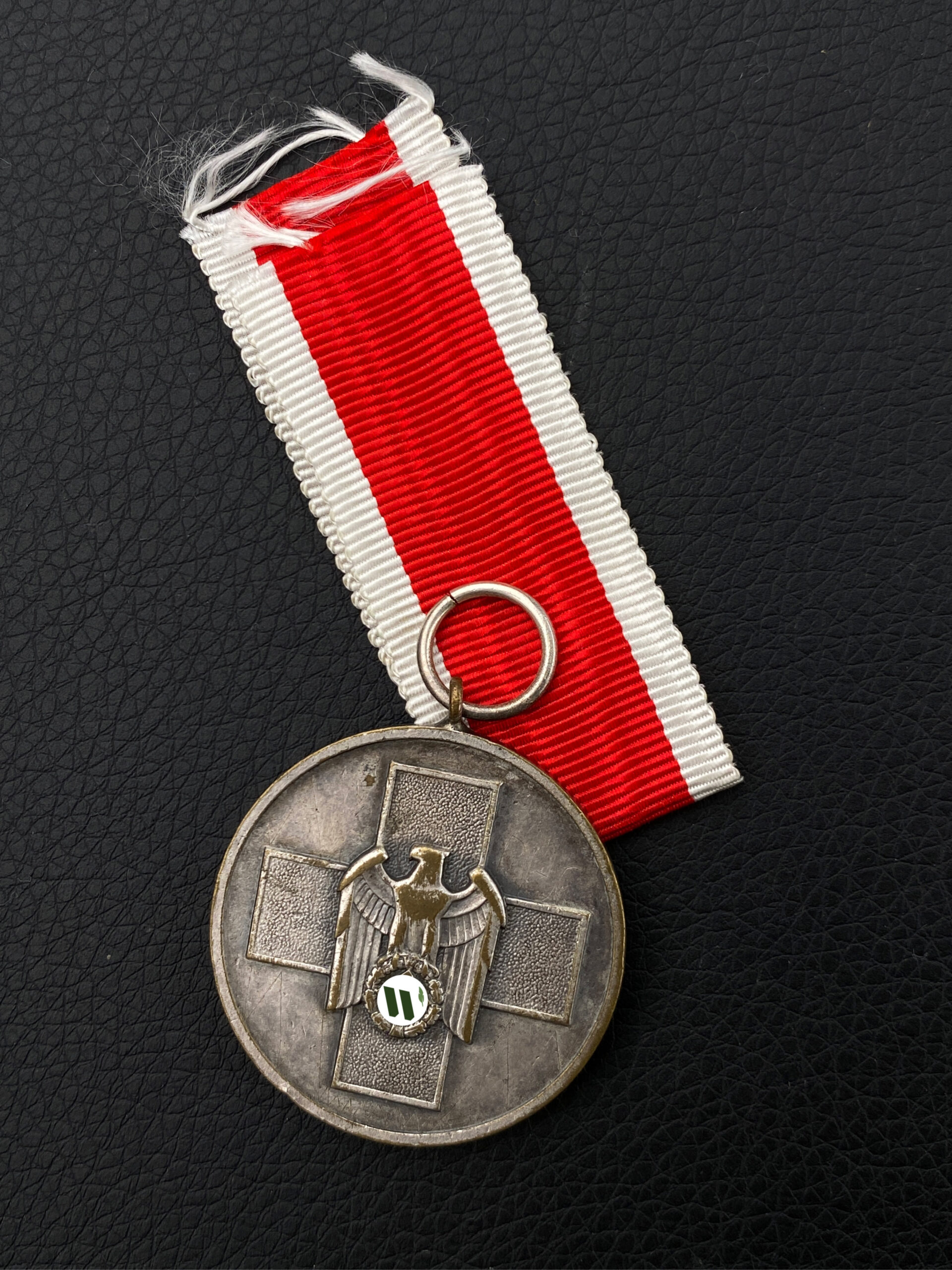 Медаль “За заботу о немецком народе”.