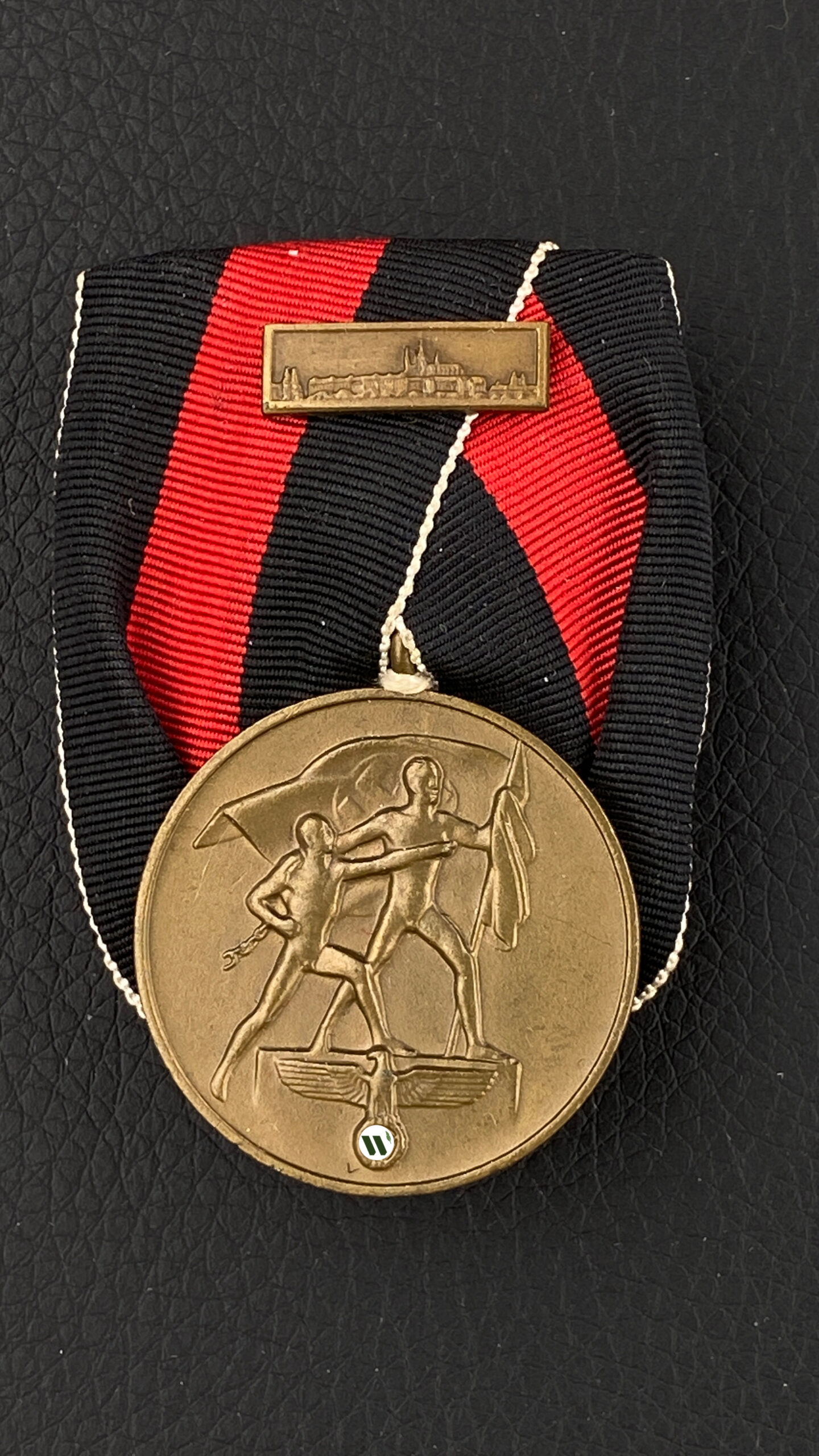 Медаль Аншлюс Судетской области с планкой Прагебург на одиночной колодке.