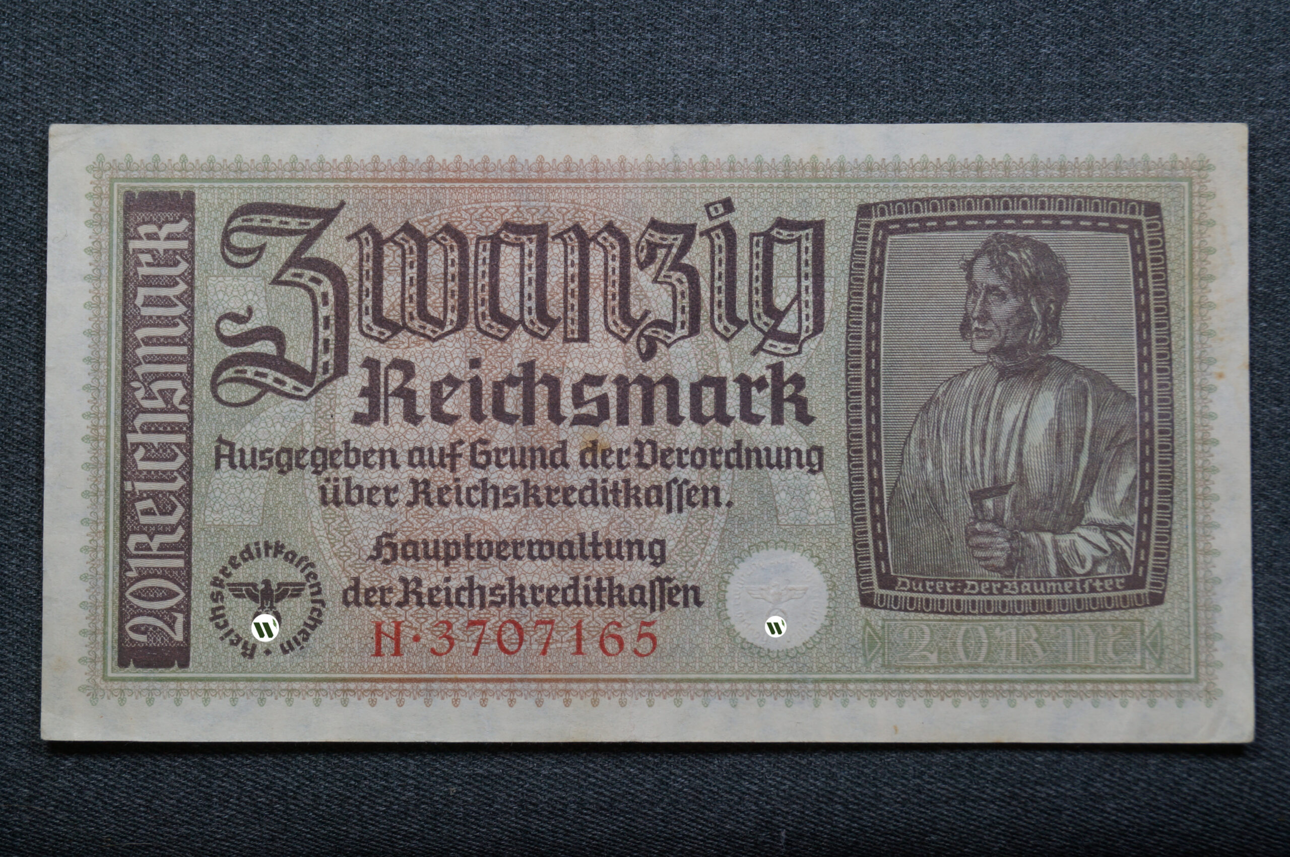 Немецкая банкнота номиналом в 20 рейхсмарок для окупированных территорий, размер 80 на 155мм.