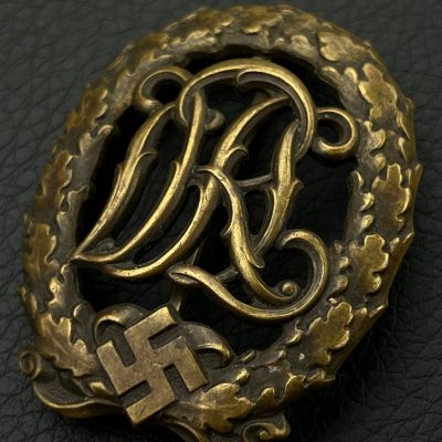  Немецкий имперский знак отличия за физическую подготовку "DRL" образца 1937 года в бронзе. [WERNSTEIN] D.R.G.M.. От Алексея С.