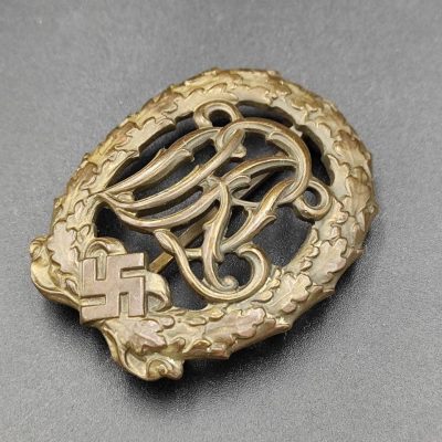  Немецкий имперский знак отличия за физическую подготовку "DRL" образца 1937 года в бронзе. [WERNSTEIN] D.R.G.M.. 