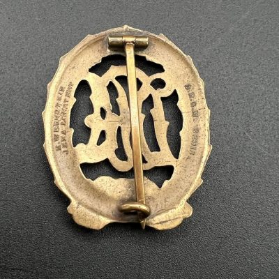  Немецкий имперский спортивный знак "DRA" образца 1913 года в бронзе. [H.W. ERNSTEIN] D.R.G.M.. От Алексея С.