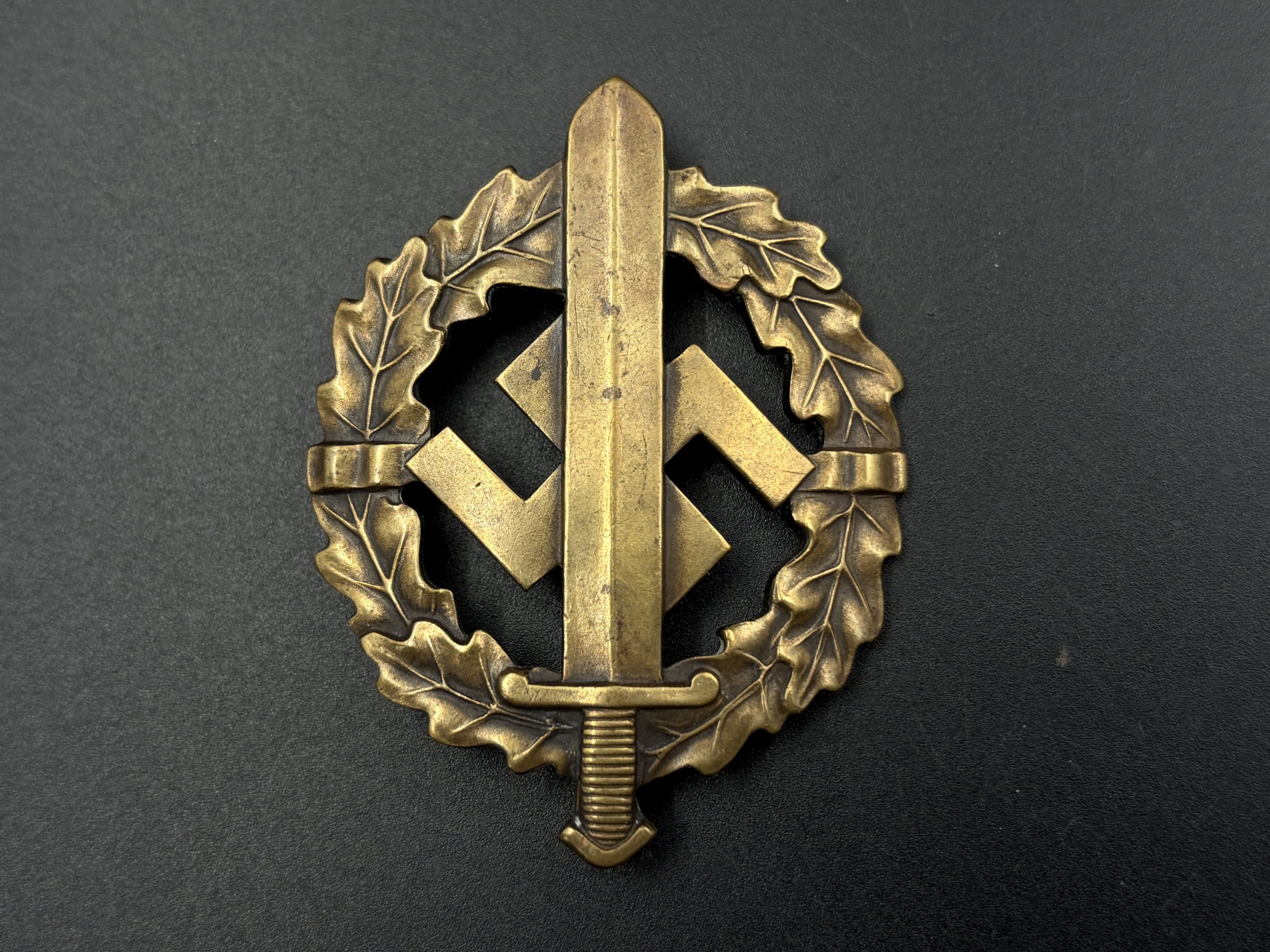 Спортивный знак подразделений SA образца 1933 года в бронзе. [L. CHR. LAUER] Спортивный знак подразделений SA образца 1933 года в бронзе. [L. CHR. LAUER] От Алексея С.